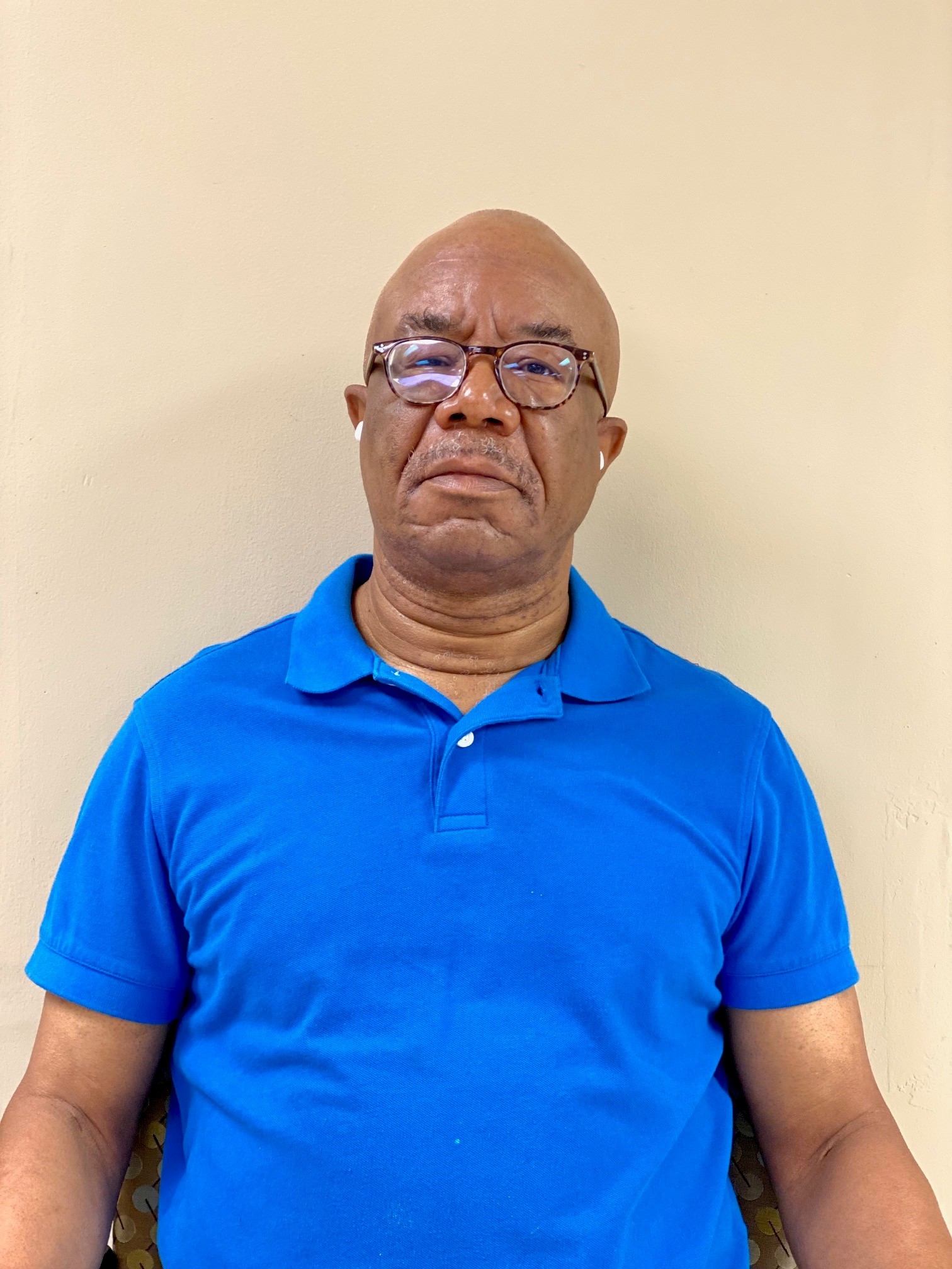 Photo of Wilfred, born with astigmatism, who found a community at Lions Services in 2017 through his local library